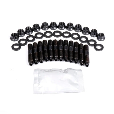 Set of black screws and washers with a clear plastic bag on a white background