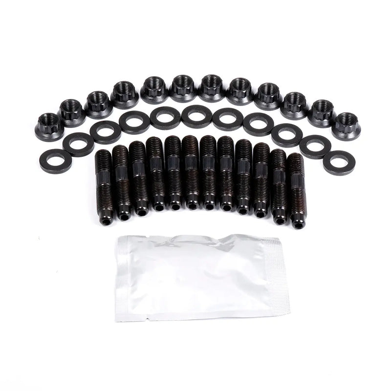 Set of black screws and washers with a clear plastic bag on a white background